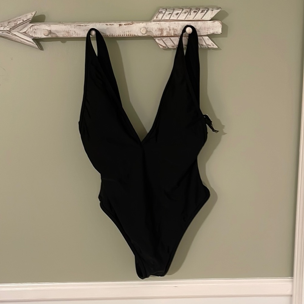Lox cut low back sexy one piece new with tags and hygiene liner